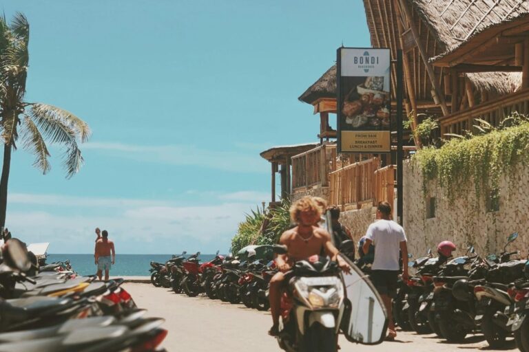 Street view of the busy lifestyle hub near Canggu beach, showcasing the area's demand for Bali property investment in 2026.